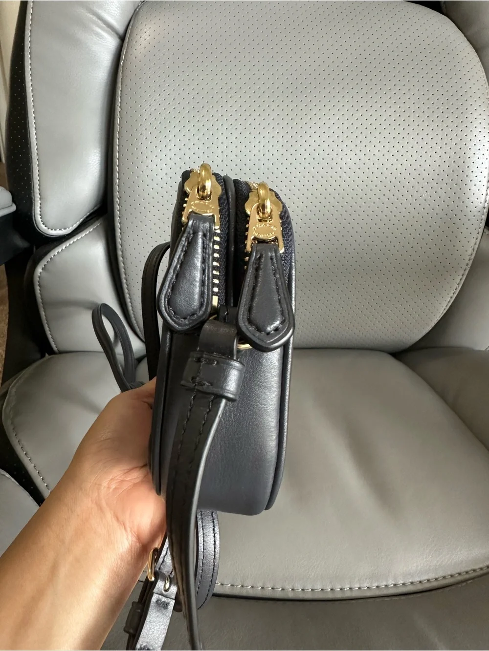 Coach sleek black